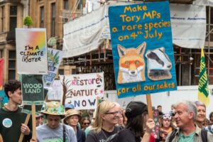 London UK - Jun 22 2024: People protest against the conservative government at the Restore Nature Now March for environmental protection. Organisations present included the RSPB, W; Shutterstock ID 2479235175; purchase_order: -; job: -; client: -; other: -